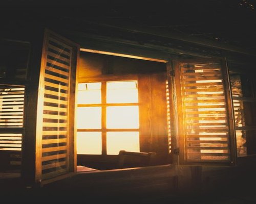 Soft light coming through window shutters during a very bright and sunny day in Merida, distributing illumination evenly